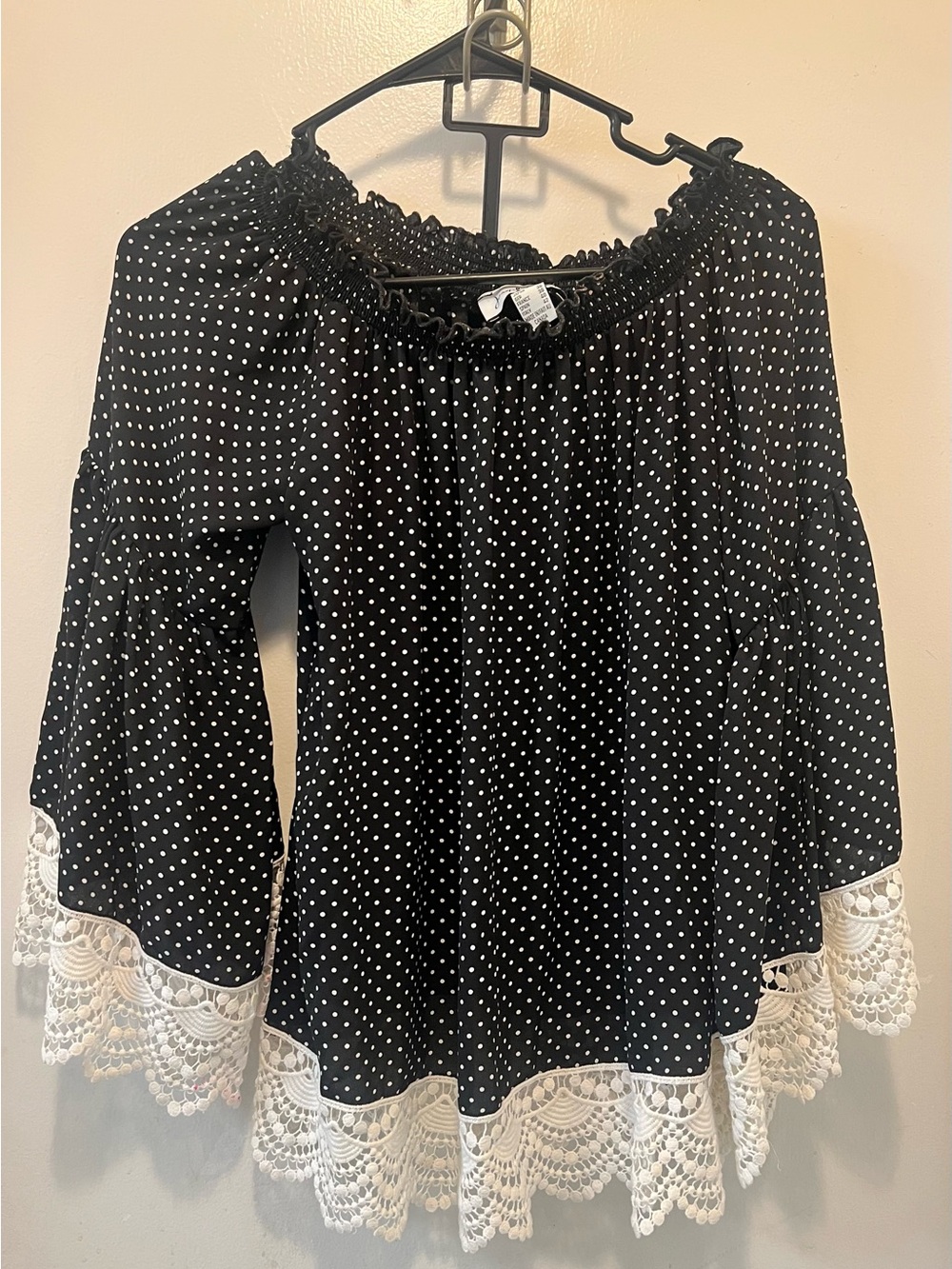 Joseph Ribkoff Black and White Polka Dot Off-Shoulder Blouse with Lace Hem